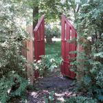 Proprietor Jerry Lapp is a ceramic and visual artist, carpenter, and spiritual director. He constructed these gates to lead into the shady, comfortable yard of the home he and Alma share with a variety of plants and wildlife.
